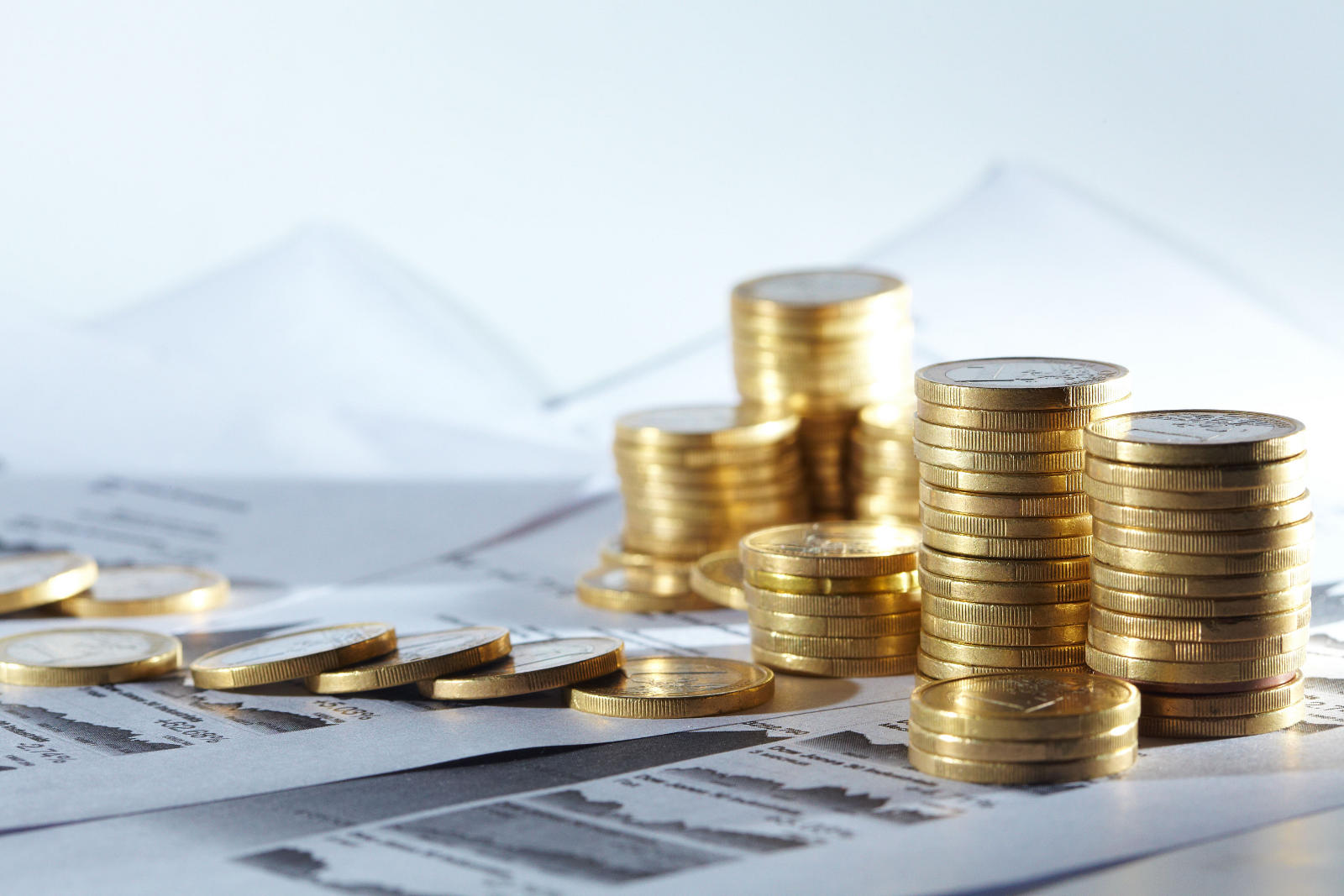 Business diagram on financial report with coins TFGP.